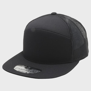 May include: Black flat-brimmed baseball cap with a mesh back. The front of the cap is solid black, with a small button on top. The brim is slightly curved. The cap has a tag that says "CAMBRIDGE PD308".