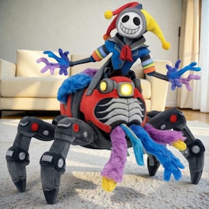 May include: A plush toy featuring a jester character with a white mask and colorful hat riding a mechanical spider. The spider has a red body, a glowing yellow light, and six dark gray legs. Long purple and blue faux fur accents hang down.