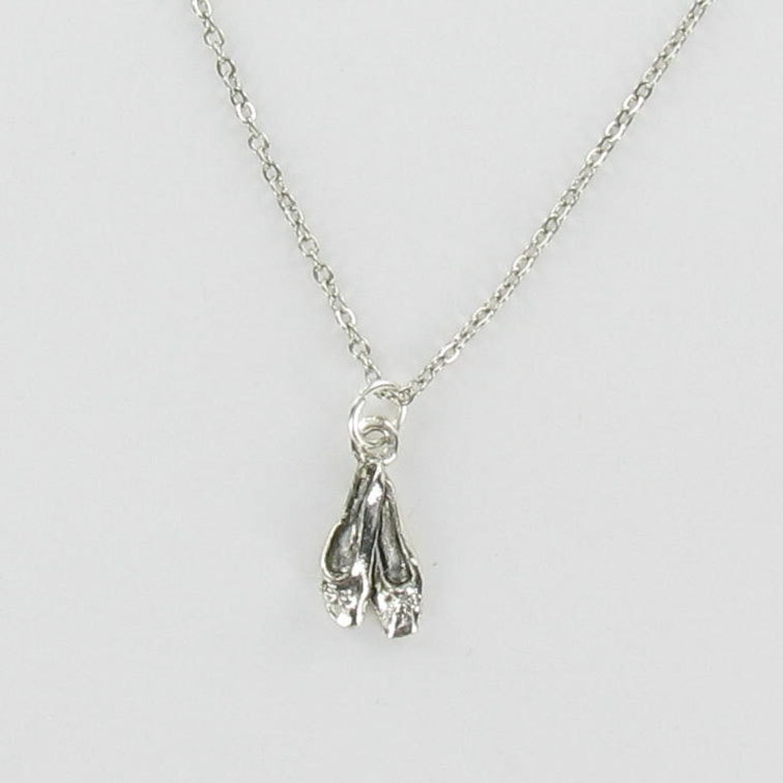 ballet slippers necklace - pewter charm on a free plated chain - dance shoes toe ballet slippers necklace - pewter charm on a free plated chain - dance shoes toe