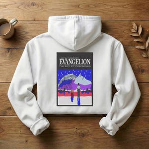 May include: White hooded sweatshirt featuring a graphic from Neon Genesis Evangelion. The graphic includes the text "NEON GENESIS EVANGELION" and "THE END OF EVANGELION" with an illustration of a figure and a mountain scene.
