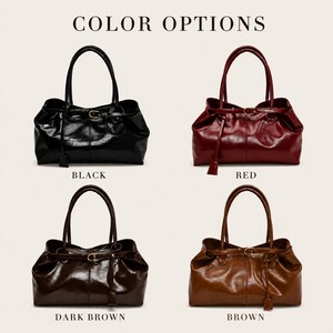 May include: Four handbags labeled COLOR OPTIONS, BLACK, RED, DARK BROWN, and BROWN. Each bag features a glossy finish, two top handles, and a thin horizontal strap with a gold-toned buckle detail across the front. The bags are shown in black, red, dark brown, and brown.