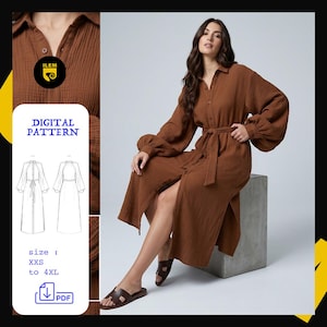 Peut inclure: Une robe marron boutonnée avec de longues manches bouffantes et une ceinture assortie. La robe est portée par une personne assise sur un bloc gris. L'image comprend également un motif numérique avec le texte "DIGITAL PATTERN" et des tailles de XXS à 4XL.