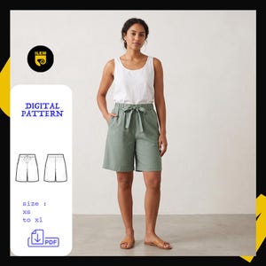 May include: A white sleeveless tank top and sage green shorts with a drawstring waist. The image includes the text ILEM, DIGITAL PATTERN, and size: xs to xl, along with a line drawing of the shorts and a PDF download icon for the sewing pattern.