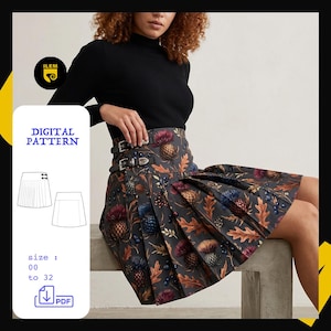 May include: A digital sewing pattern for a pleated skirt featuring a dark grey fabric with a botanical print of purple and orange thistles, brown oak leaves, and blue berries. The skirt has a high waist with two side buckle straps. Text includes ILEM, DIGITAL PATTERN, size 00 to 32, and PDF.