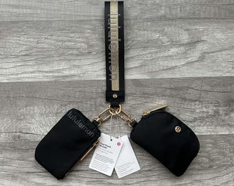 Lululemon Dual Pouch Wristlet Black and Gold Wordmark New With Tags