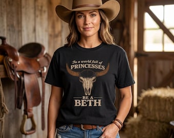 In einer Welt voller Prinzessinnen sei wie Beth – T-Shirt | Western-T-Shirt mit Kuhschädel