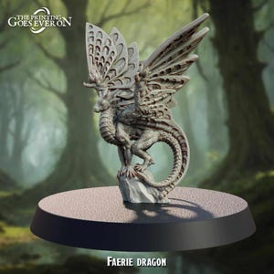 May include: A detailed grey sculpture of a Faerie Dragon with intricate, butterfly-like wings. The dragon is perched on a rock atop a round base. The text "THE PRINTING GOES EVER ON" is at the top left, and "FAERIE DRAGON" is at the bottom.