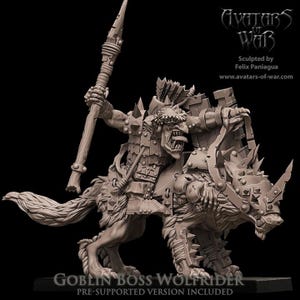 May include: A detailed, gray Goblin Boss Wolf Rider miniature. The goblin is armored and wielding a spear, riding a wolf-like creature. The miniature is pre-supported and includes the text "GOBLIN BOSS WOLFRIDER" and "PRE-SUPPORTED VERSION INCLUDED".