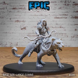 May include: A gray miniature figure of a warrior riding a large cat-like creature, with a bow and arrow. The figure is mounted on a black base. The text "EPIC Miniatures" is at the top. The base size is large (51mm).
