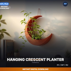 May include: A terracotta-colored, crescent-shaped hanging planter filled with green plants. The planter is mounted on a white wall. The text "HANGING CRESCENT PLANTER" is displayed at the bottom. The image also includes the text "STL FILE INSTANT DOWNLOAD".
