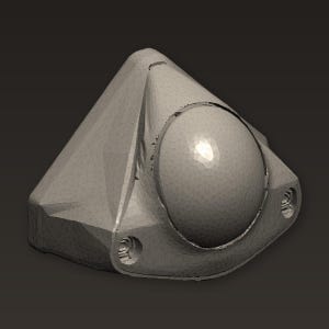 May include: A 3D-rendered, gray, geometric object with a triangular top and a rounded, spherical center. The object has two circular holes on the sides and appears to be a digital model or prototype.