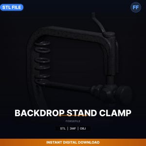 May include: A black backdrop stand clamp with a spring mechanism. The text "BACKDROP STAND CLAMP" is displayed in white. The image also includes the text "STL FILE" and "INSTANT DIGITAL DOWNLOAD".