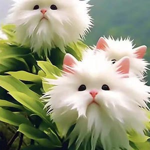 May include: Three fluffy white cat-like figures with black eyes and pink noses and ears are nestled among green leaves. The soft, textured appearance of the figures gives them a whimsical, almost dreamlike quality.