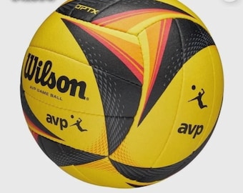Balón oficial de torneo Wilson AVP OPTX Pro Beach Volleyball, color amarillo y negro.