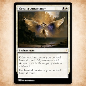 May include: A rectangular trading card titled Greater Auramancy with a white border and black frame. The artwork depicts a winged figure hovering over water. The text reads: Enchantment, Other enchantments you control have shroud, Enchanted creatures you control have shroud.
