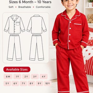 May include: A red pajama set with white piping, featuring a long-sleeved button-down shirt with a chest pocket and matching long pants. The text reads Kids Pajama Set, Red & White, Sizes 6 Month - 10 Years, Soft, Breathable, Comfortable, Available Sizes.