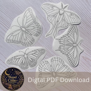 May include: Five gray and white butterfly embroidery patterns on a light wood grain surface. The butterflies are in various designs, with detailed wing patterns. The text "Digital PDF Download" is visible. A circular logo with the text "Thread and Cinder" is in the lower left corner.