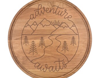 Adventure Awaits - Round Cutting Board 13.5" | Camper RV Gift, Travel, Charcuterie, Outdoors gifts, Adventurous, Campfire Chef, Gift Basket