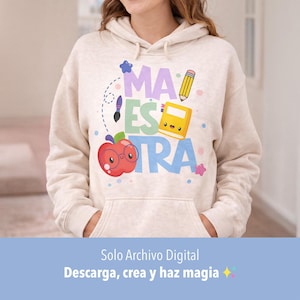 May include: Beige hoodie with a colorful graphic that says "MAESTRA" with an apple wearing glasses, a pencil, and a book. The hoodie has a front pocket and a drawstring hood. The bottom of the image has the text "Solo Archivo Digital" and "Descarga, crea y haz magia".