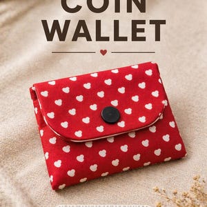 Könnte beinhalten: Rotes Münzportemonnaie mit weißem Herzmuster, verschlossen mit einem schwarzen Knopf. Der Text "COIN WALLET" steht über dem Portemonnaie, mit "PDF PATTERN" darüber und "Beginner Friendly" darunter.