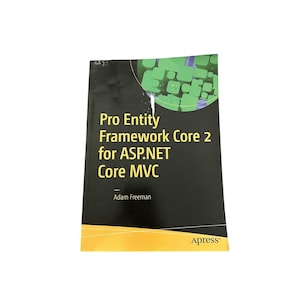Pode incluir: Um livro preto intitulado "Pro Entity Framework Core 2 for ASP.NET Core MVC" de Adam Freeman. A capa apresenta formas geométricas verdes e brancas e o logotipo da Apress.
