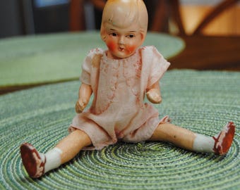 Rare Vintage Bisque Doll with a Top Knot Loop 6 1/2" tall