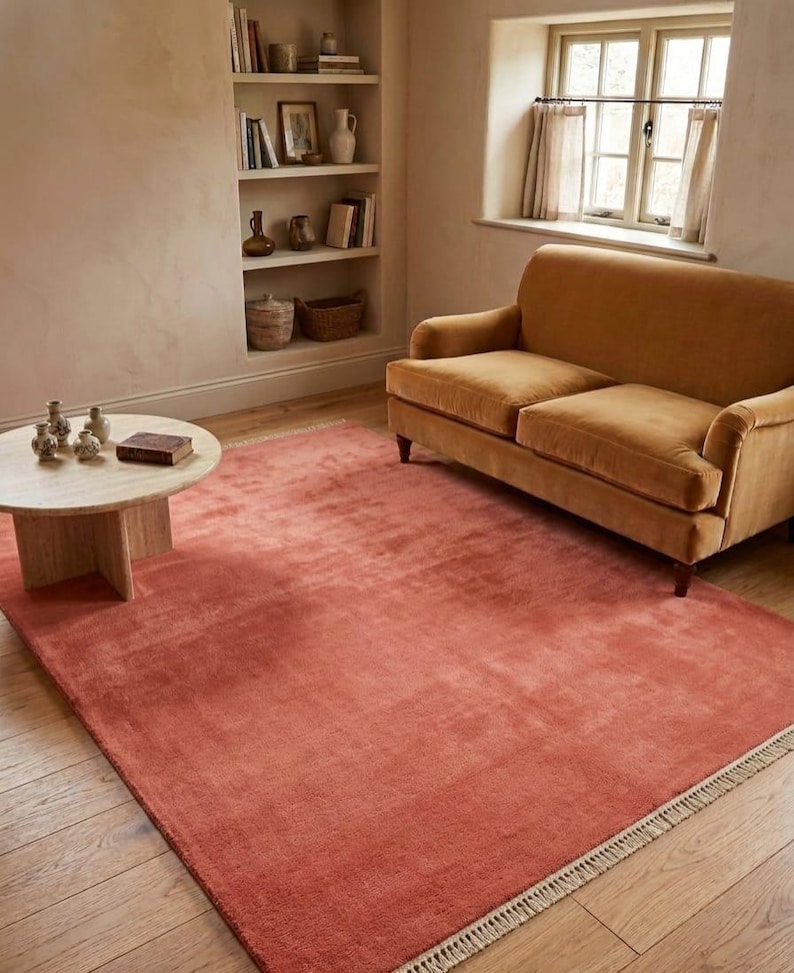Minimalist burnt orange wool rug living room decor