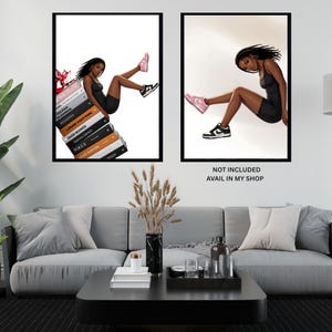 May include: Two framed art prints. One shows a woman in a black dress and sneakers, leaning on a stack of books with designer names. The other print features the same woman in a similar pose. The text "NOT INCLUDED AVAIL IN MY SHOP" is at the bottom.