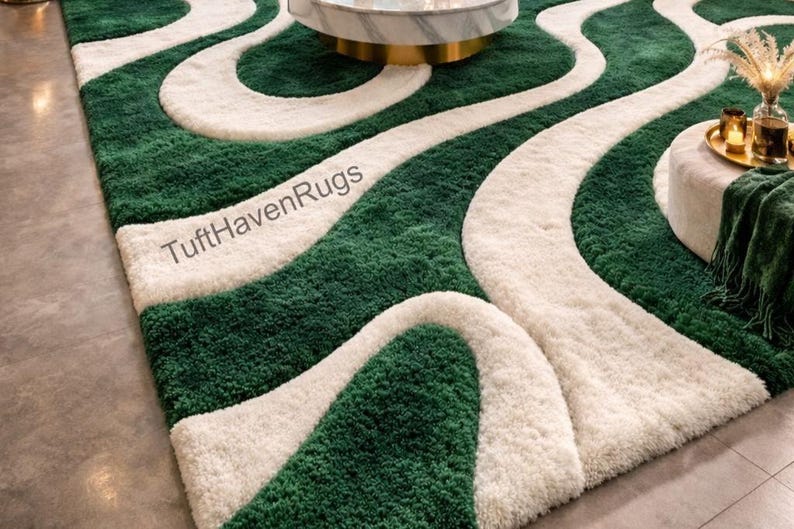 May include: A green and white patterned rug with a wavy design. The rug has a plush texture and features a repeating pattern of green and white stripes. The text "TuftHavenRugs" is visible on the rug.