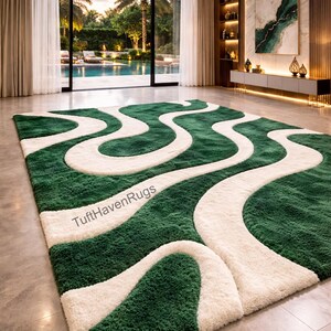 May include: A large, rectangular rug with a green and white wavy design. The rug features a plush, textured surface. The text "TuftHavenRugs" is visible on the rug. The rug is in a well-lit room with a view of a pool and palm trees.