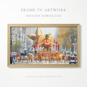 May include: A framed artwork depicting the Macy's Thanksgiving Day Parade. The image features a large turkey float, a star-shaped balloon, and marching band members. The text "Macy's Parade" is visible.