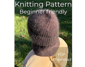 May include: A brown knitted hat, with a brim, is shown in the image. The text "Knitting Pattern Beginner friendly" is at the top of the image. The text "PDF Download" is at the bottom of the image.