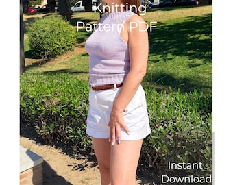 May include: A sleeveless light purple knitted top with a ribbed crew neckline and a ribbed hem, paired with white shorts and a brown belt. The image includes the text Knitting Pattern PDF and Instant Download in white lettering.