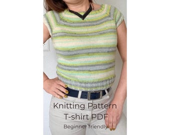 May include: A short-sleeved, knitted t-shirt in shades of green, gray, and cream. The shirt has horizontal stripes and a scoop neckline. The image also includes the text "Knitting Pattern T-shirt PDF Beginner friendly".