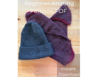 May include: A knitted hat and scarf set in shades of blue and purple. The hat is a solid blue, while the scarf is a mix of purple and burgundy. The words "Beginner Knitting Patterns PDF" and "Instant Download" are visible.