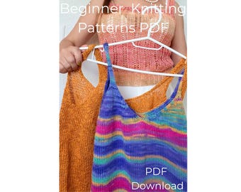 May include: Three knitted tank tops in shades of orange, pink, and blue-purple are displayed on a white hanger. The text "Beginner Knitting Patterns PDF Download" is visible. The tank tops have a V-neck design and are made of a lightweight, open-weave knit.