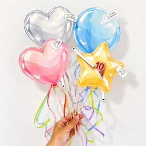 May include: A collection of four balloon-shaped decorations on sticks: a clear heart, a pink heart, a blue circle, and a yellow star. The star contains a 10 Euro bill. Attached tags feature the text Happy Birthday, alles Liebe, Mit besten Wünschen, and Ein kleiner Gruß.