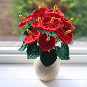 May include: A rustic wooden sign with the text "Welcome to our home" in white lettering. The sign features a distressed finish and a simple, inviting design, perfect for a front porch or entryway.