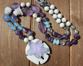 Seaside Symphony: Lavender Sea Glass and Gemstone Necklace with Sand Dollar Pendant