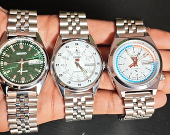 Zestaw 3 zabytkowych automatycznych zegarków naręcznych Seiko 5 ze stali nierdzewnej, wyprodukowanych w Japonii