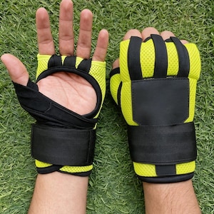 May include: A pair of fingerless athletic gloves featuring a bright neon yellow mesh fabric and black accents. The gloves include a black wrist strap with a hook-and-loop closure, a padded palm area, and individual finger loops for a secure fit.