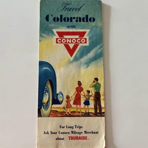 May include: Vintage travel brochure for Colorado with the Conoco logo. The brochure features a retro illustration of a family and a classic car. Text includes "Travel Colorado with Conoco" and "For Long Trips."