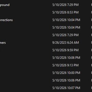 May include: A dark background displays a list of file folders, including "3D Background," "3D Files," and "Color Corrections." Each folder has a corresponding date and time, such as "5/10/2026 7:29 PM," and is labeled as a "File folder."