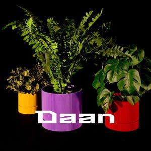 May include: A set of three ceramic mugs with a speckled, matte finish. The mugs are in shades of cream, light gray, and dark gray. Each mug has a simple, minimalist design, perfect for coffee or tea.