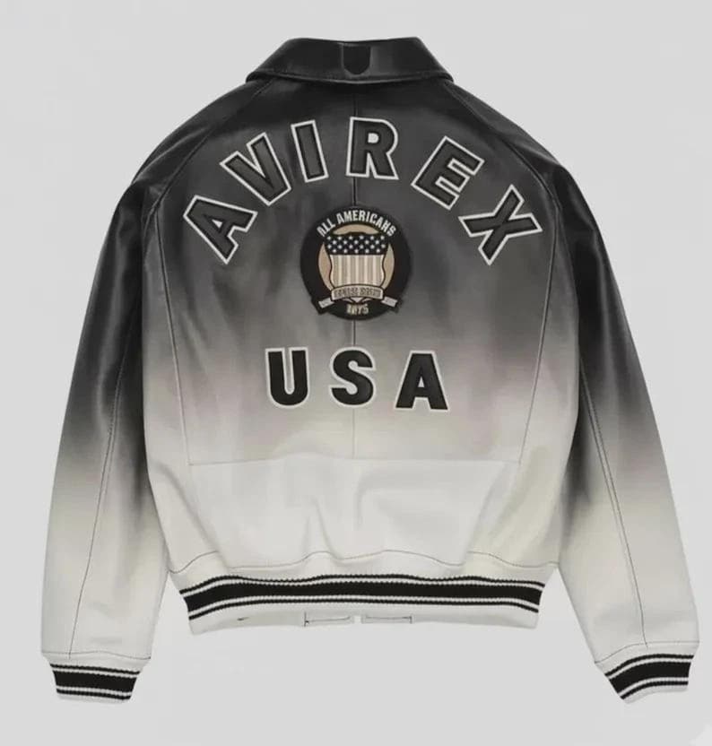 May include: Black and white leather jacket with the word "AVIREX" across the shoulders and "USA" at the bottom. The jacket has a patch with the words "ALL AMERICANS" and a design of the American flag. The jacket has a black and white striped trim.