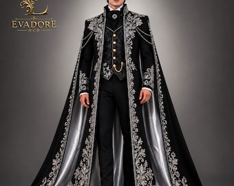 May include: A black floor-length cape and matching suit featuring intricate silver floral embroidery. The ensemble includes a dark patterned waistcoat with gold buttons, a high-collared jacket, black trousers, and a silver chain detail. The cape has a silver lining.