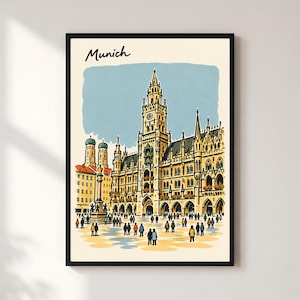 Puede incluir: Una lámina artística enmarcada que presenta una ilustración estilizada del ayuntamiento de Múnich en Alemania. La escena muestra la arquitectura gótica con una torre del reloj, una columna central y personas caminando por la plaza bajo un cielo azul claro. La palabra Munich está impresa en letra cursiva negra en la esquina superior izquierda sobre un fondo color crema.