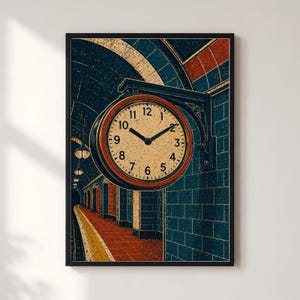 May include: A framed wall art print featuring a round analog clock mounted on a dark blue tiled subway wall. The clock face is cream with black numerals and hands. The background depicts a tunnel with red flooring, yellow platform edges, and lights.