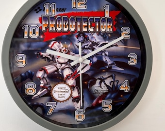 Orologio da parete Probotector da 20 cm – Decorazione retrò per appassionati di videogiochi NES