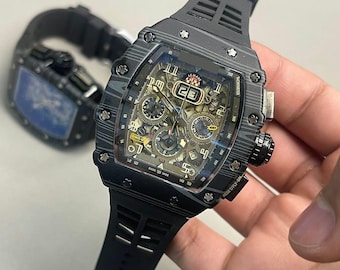 Orologio cronografo scheletrato / Cassa in acciaio al carbonio nero, cinturino in gomma, stile sportivo